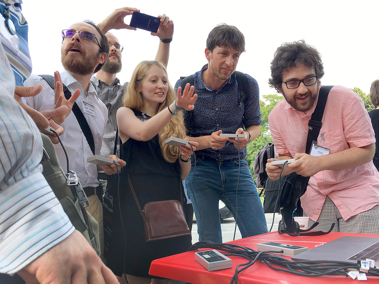 A crowd of people playing together at the DiGRA 2018 academic conference in Turin, Italy.